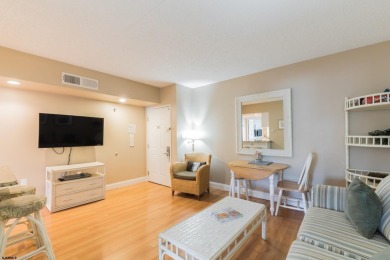 Renovated 1-bedroom condo with laminate flooring throughout
