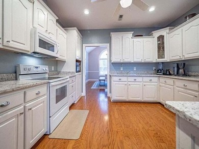 Welcome to this beautiful 4 bedroom brick home with overlooking - photo 7