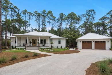 Tucked along a serene .79-acre homesite in one of Panama City - photo 1