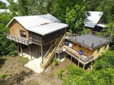 Lake Home For Sale in Altha, Florida