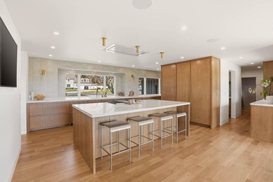 Step into this iconic 1.21-acre High Drive estate, thoughtfully - photo 13