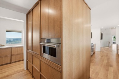Step into this iconic 1.21-acre High Drive estate, thoughtfully - photo 17