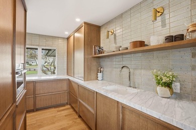 Step into this iconic 1.21-acre High Drive estate, thoughtfully - photo 18