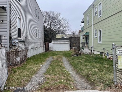 Two family residence in need of updating, offering a strong - photo 6