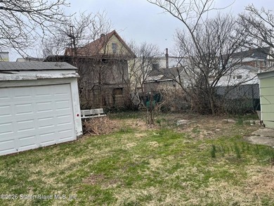 Two family residence in need of updating, offering a strong - photo 7