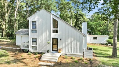 Welcome to this gorgeous 4-bedroom, 2-bath lakefront home - photo 3
