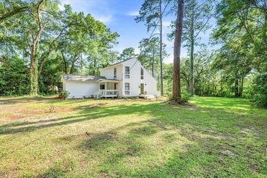 Welcome to this gorgeous 4-bedroom, 2-bath lakefront home - photo 7