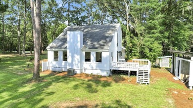 Welcome to this gorgeous 4-bedroom, 2-bath lakefront home - photo 8