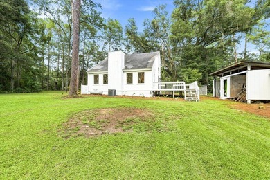 Welcome to this gorgeous 4-bedroom, 2-bath lakefront home - photo 9