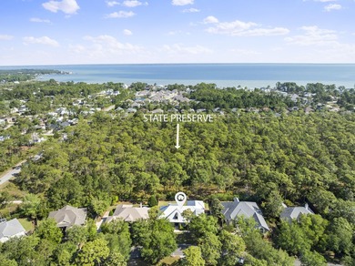 Tucked within the exclusive, gated waterfront community of - photo 2