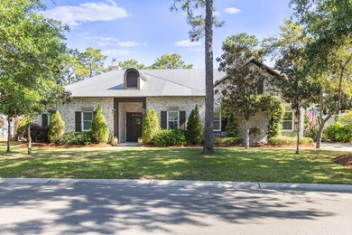Tucked within the exclusive, gated waterfront community of - photo 3