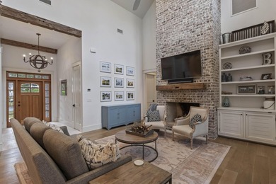 Tucked within the exclusive, gated waterfront community of - photo 4