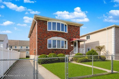 South Beach - welcome to this 6/6 2-family, fully brick, and - photo 3