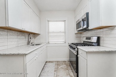 South Beach - welcome to this 6/6 2-family, fully brick, and - photo 10