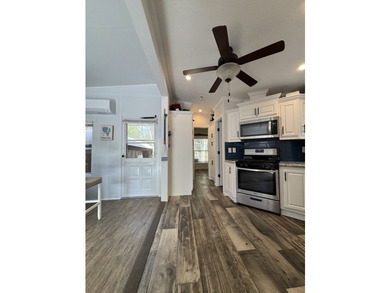 Welcome to your serene escape at Point Sebago. This 2-bedroom - photo 4