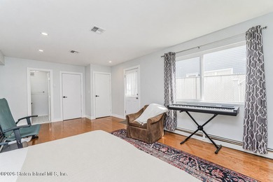 Welcome to this beautifully maintained semi-attached home in the - photo 3
