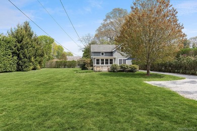 Set on 0.56 acres in one of Westhampton's most desirable - photo 2