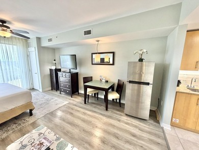 Beautifully perched on the seventh floor, this light and airy - photo 5