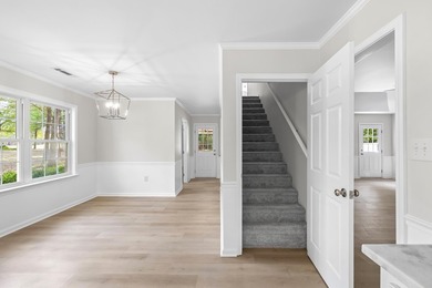 TOTALLY RENOVATED, ALL NEW KITCHEN, FRESH PAINT, NEW FLOORING - photo 7