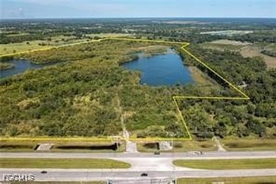 163+ acres located in Hendry County on SR 80 W. Directly across - photo 2