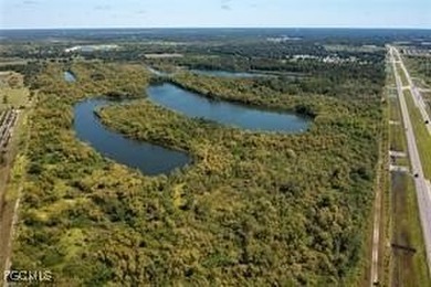 163+ acres located in Hendry County on SR 80 W. Directly across - photo 6