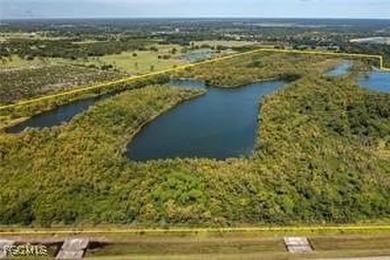 163+ acres located in Hendry County on SR 80 W. Directly across - photo 8
