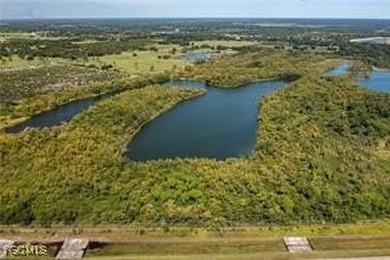 163+ acres located in Hendry County on SR 80 W. Directly across - photo 9