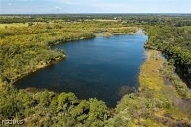 163+ acres located in Hendry County on SR 80 W. Directly across - photo 10