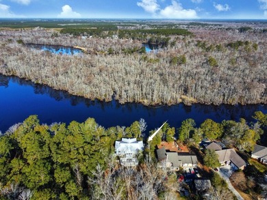 Welcome to 462 Mohican Drive, a stunning riverfront retreat - photo 5