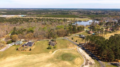 Beautiful corner lot overlooking the 11th hole of the Wyboo Golf - photo 3