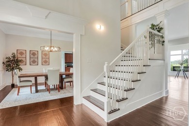 Situated on over an acre of beautifully landscaped marshfront - photo 12