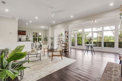 Situated on over an acre of beautifully landscaped marshfront - photo 19