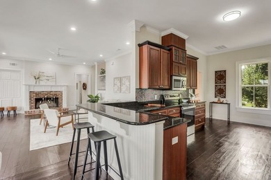 Situated on over an acre of beautifully landscaped marshfront - photo 22