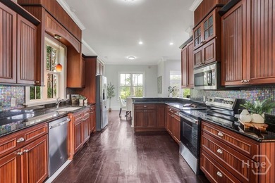 Situated on over an acre of beautifully landscaped marshfront - photo 24