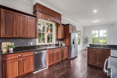 Situated on over an acre of beautifully landscaped marshfront - photo 25