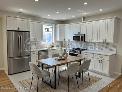 *New Construction* Stunning Two Family detached house with 9ft - photo 5
