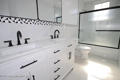 *New Construction* Stunning Two Family detached house with 9ft - photo 7