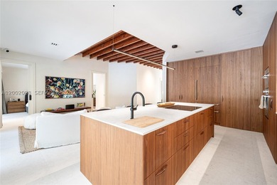 Welcome to this stunning Miami Beach residence where privacy - photo 8