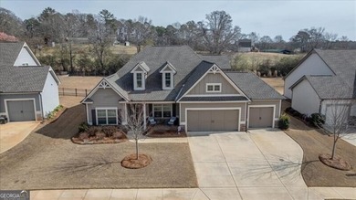 Welcome to your dream home in the coveted Grand Haven community