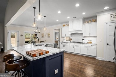 Welcome to your dream home in the coveted Grand Haven community