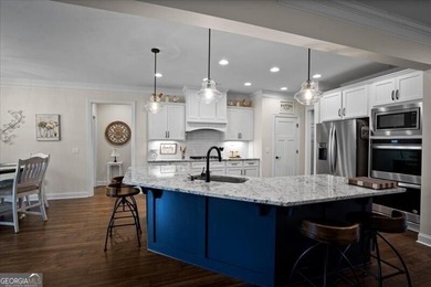 Welcome to your dream home in the coveted Grand Haven community