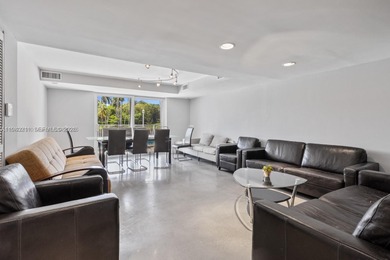 Welcome to this exceptional 2-bedroom, 2-bath condo perched on