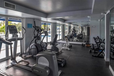 Welcome to this exceptional 2-bedroom, 2-bath condo perched on