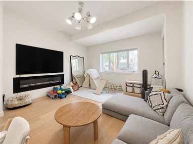 Welcome to this warm and inviting detached single-family home - - photo 4