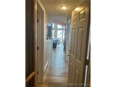 > A wall of windows and vaulted ceilings. Main level living! Big - photo 17
