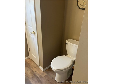 > A wall of windows and vaulted ceilings. Main level living! Big - photo 24