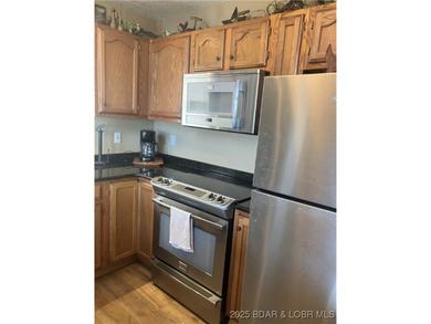 > A wall of windows and vaulted ceilings. Main level living! Big - photo 25