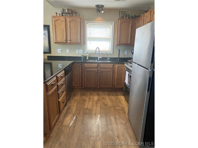> A wall of windows and vaulted ceilings. Main level living! Big - photo 27