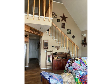 > A wall of windows and vaulted ceilings. Main level living! Big - photo 28