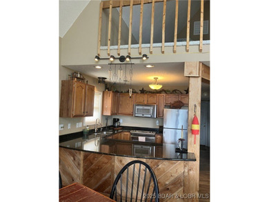 > A wall of windows and vaulted ceilings. Main level living! Big - photo 30